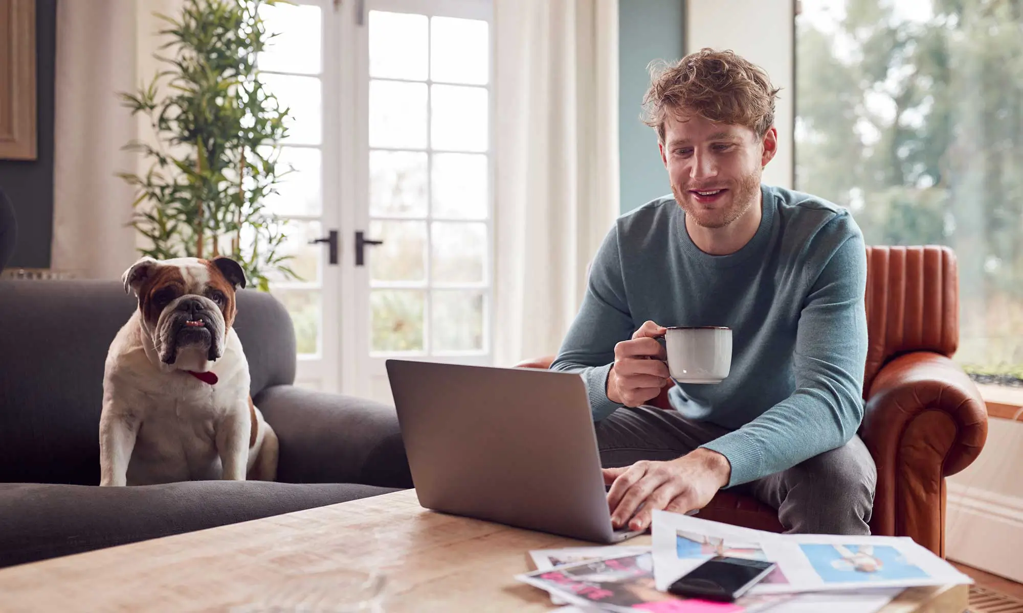 A man and his dog looking at resources